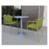 Aceray 909 steel table, round top with aluminum finish on patio of Utah hotel with Lido-3 armchair in green finish